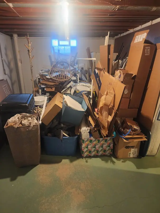 Roll-off dumpster container at job site for 2 Yard Dumpster Rental in Anderson Creek